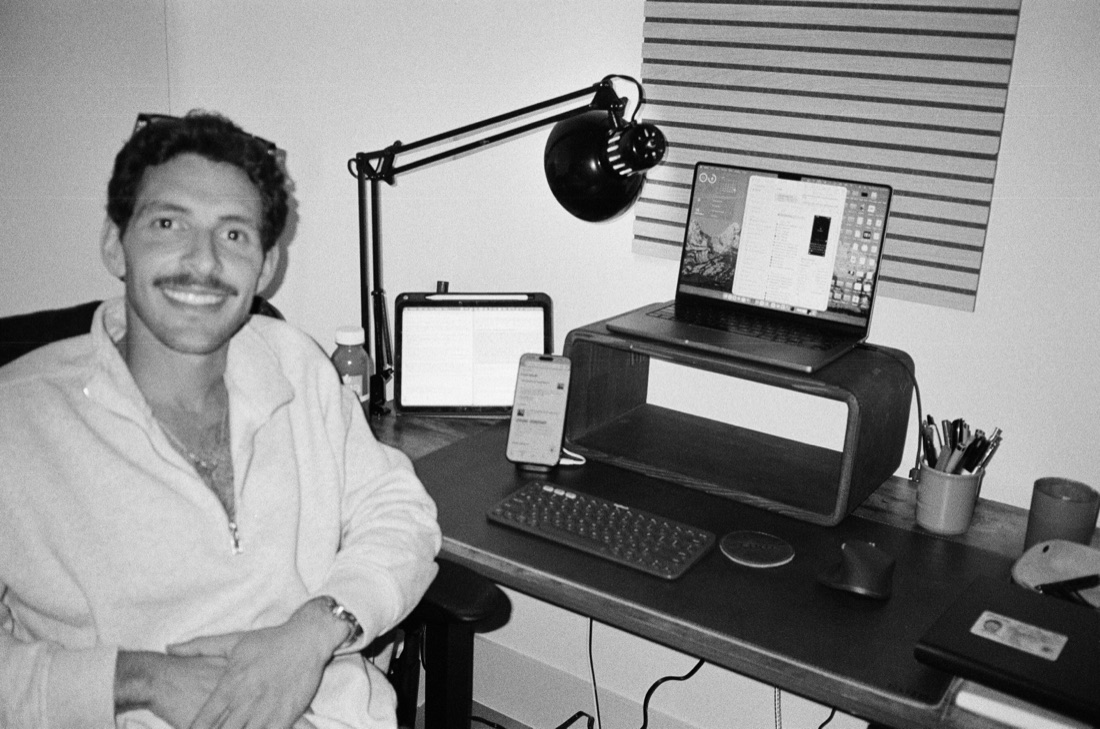 Dov, founder of ConstructionBear, at his desk